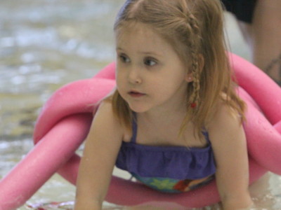 girl in swim aid likes little mermaid